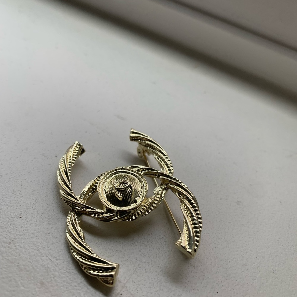 Cc brooch